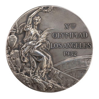 Olympische Goldmedaille Los Angeles 1932 von Rudolf Ismayr, errungen im schwerathletischen Kraftdreikampf der Mittelgewichtsklasse | Stadtarchiv Freising
